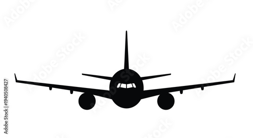 Front view of a passenger airplane in stark black silhouette
