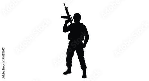 Soldier holding rifle in a stark dramatic silhouette