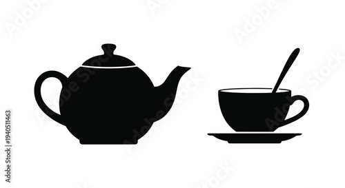 Black teapot and teacup set presented as a striking silhouette