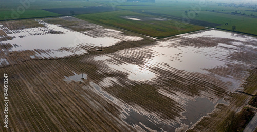 Fotografi panoramic aerial view of farmland and flooded fields due to heavy rainfall