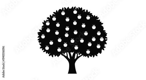 Apple tree with numerous fruits displayed in a dark silhouette