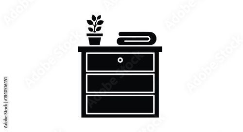 Minimalist bedside table with plant and folded towel silhouette