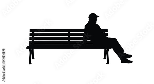 Man sitting on a park bench a striking black silhouette