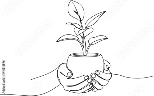A hand holding a small potted plant with leaves growing out of it