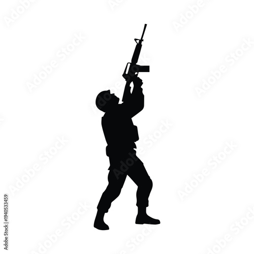 Soldier holding rifle in combat stance silhouette