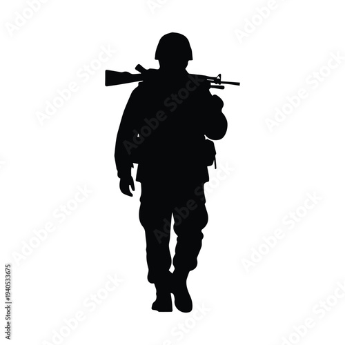 Soldier walking with rifle on shoulder in black silhouette
