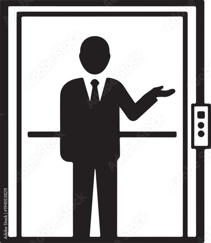 Man in suit gesturing inside elevator with control panel d