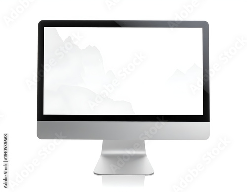Sleek silver computer displaying a misty mountain landscape