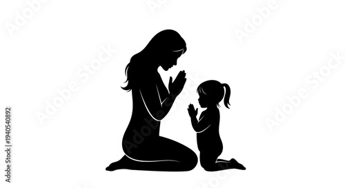 Mother and daughter praying together in silhouette.