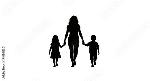Silhouette of a mother holding hands with her two children walking together.