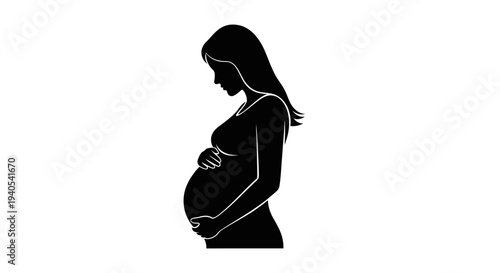 Silhouette of a pregnant woman touching her belly.