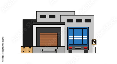 A blue truck parked at a loading dock.