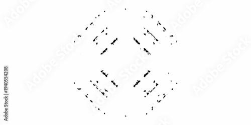 Abstract black ink splatters forming a loose diamond or kite shape