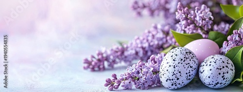 Close-up of speckled blue and pink eggs nestled among lush purple lilac flowers on a soft, blurred background