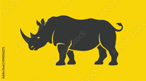 Silhouette of a Rhinoceros on a Yellow Background.