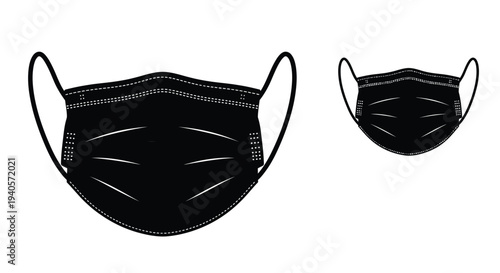 Two black face masks are displayed in a striking silhouette