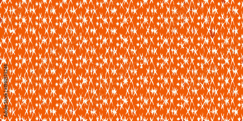 Abstract orange background with dense scattered white star like shapes