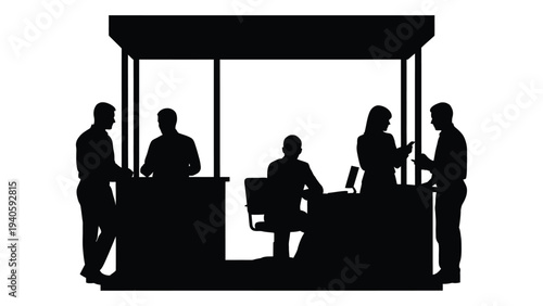 A group of people working at a kiosk