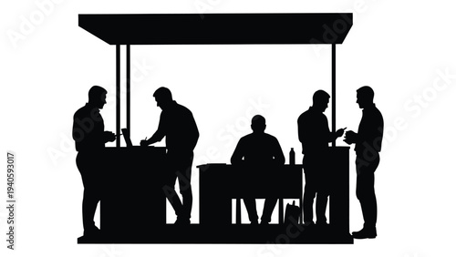 A group of people standing and sitting at a food stand