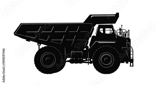 A stark silhouette depicts a large heavy duty mining dump truck showcasing its robust frame and massive hauling capabilities