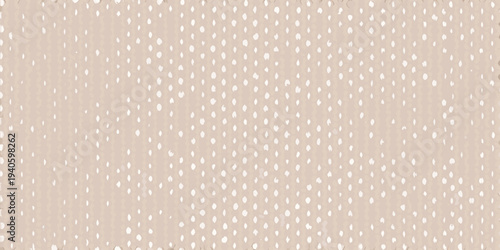 A beige background featuring a dense pattern of small white teardrop shapes