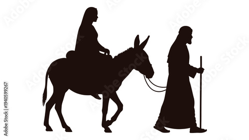 A silhouette of a woman riding a donkey with a man walking beside her