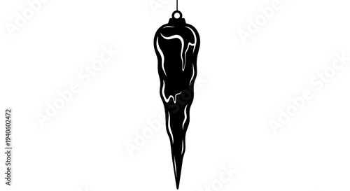 Black chili pepper ornament hanging on a string against a white background decorative spicy symbol