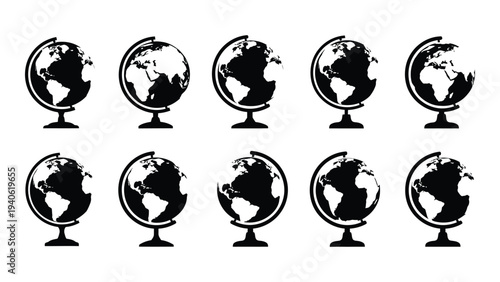 A set of black and white globes on stands