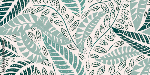Stylized tropical leaves in a seamless repeating botanical pattern