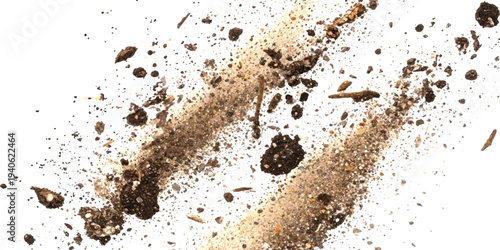 Brown soil and dirt particles scattered in two diagonal lines against a clean white background.