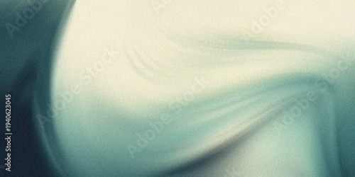 Foto Teal and cream swirl on a dark textured surface with gradient effect