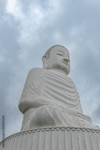 Large white statue of buddha meditating, symbolizing peace and spirituality in da nng, vietnam