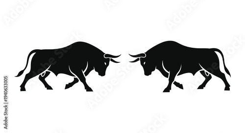 Two charging bulls face off in a dramatic black silhouette