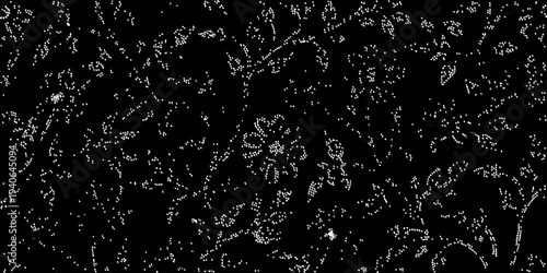 Abstract pattern of white dots against a completely black background