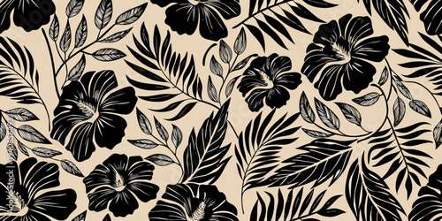 Black tropical leaves and hibiscus flowers on a beige background