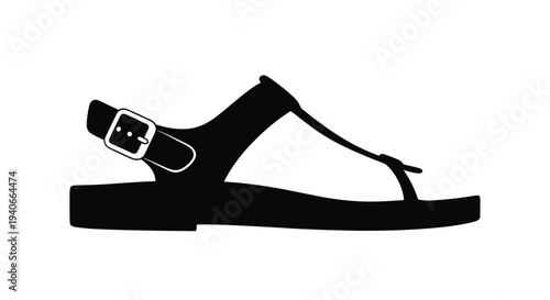 Black silhouette of a single thong sandal on a white background