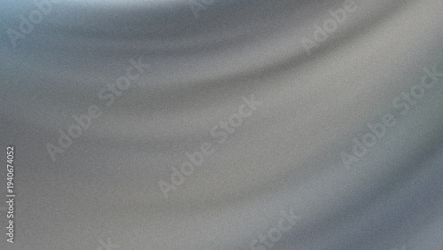 Elegant abstract background of soft grey fabric with gentle folds and smooth texture