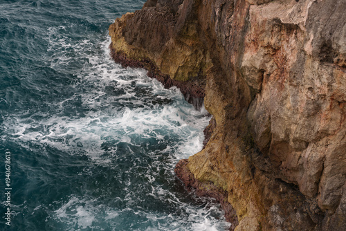 waves crashing on rocks