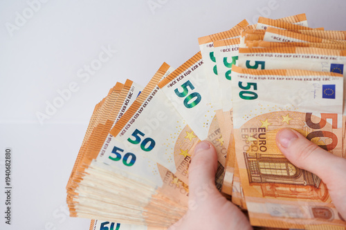 Quadro em tela lots of 50 euro banknotes in hands