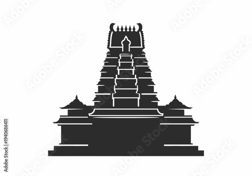 Black silhouette of a towering tiered structure resembling a South Indian temple gopuram