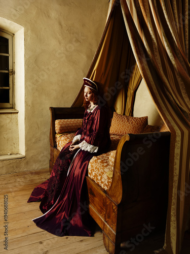 Medieval Tudor Queen on canopy bed