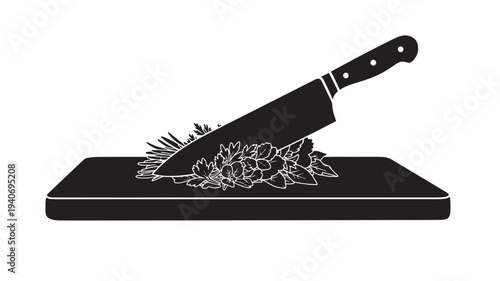 A sharp knife lies on a dark cutting board surrounded by chopped vegetables in a kitchen, viewed from the side.