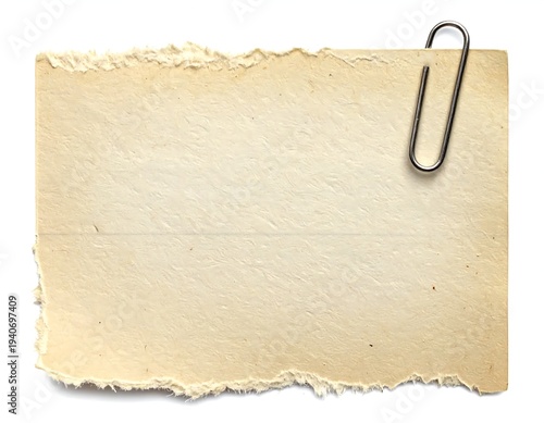 Torn Paper Note with Paperclip for Messages and Reminders.