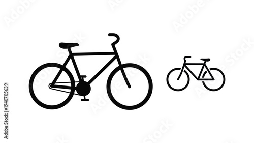 Two bicycles of differing sizes presented as a stark silhouette