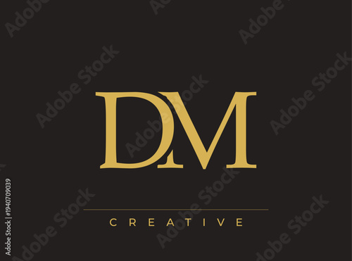 DM creative monogram logo with elegant gold lettering on dark background