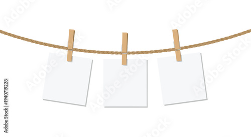 Three identical square white blank notes are neatly hung on a thick braided brown rope using wooden clothespins against a pristine white background.