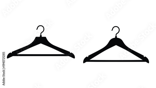 Two black clothing hangers displayed against a white background silhouette