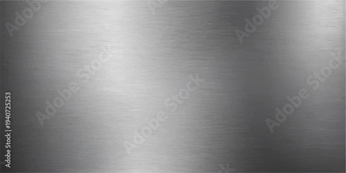 A polished silver brushed metal texture background with a shiny stainless steel surface and industrial grey aluminum plate pattern featuring chrome material reflections