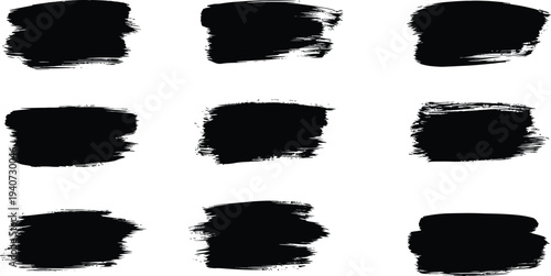 A collection of nine black brush strokes on a white background for artistic design