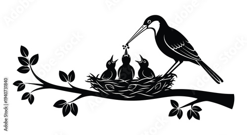 A parent heron feeds its young chicks within a woven nest on a branch depicted as a silhouette high quality professional